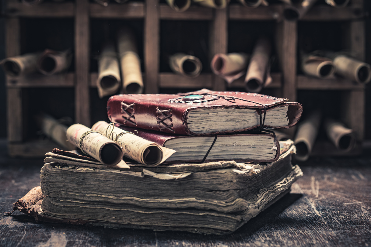 Magic scrolls and books in medieval library